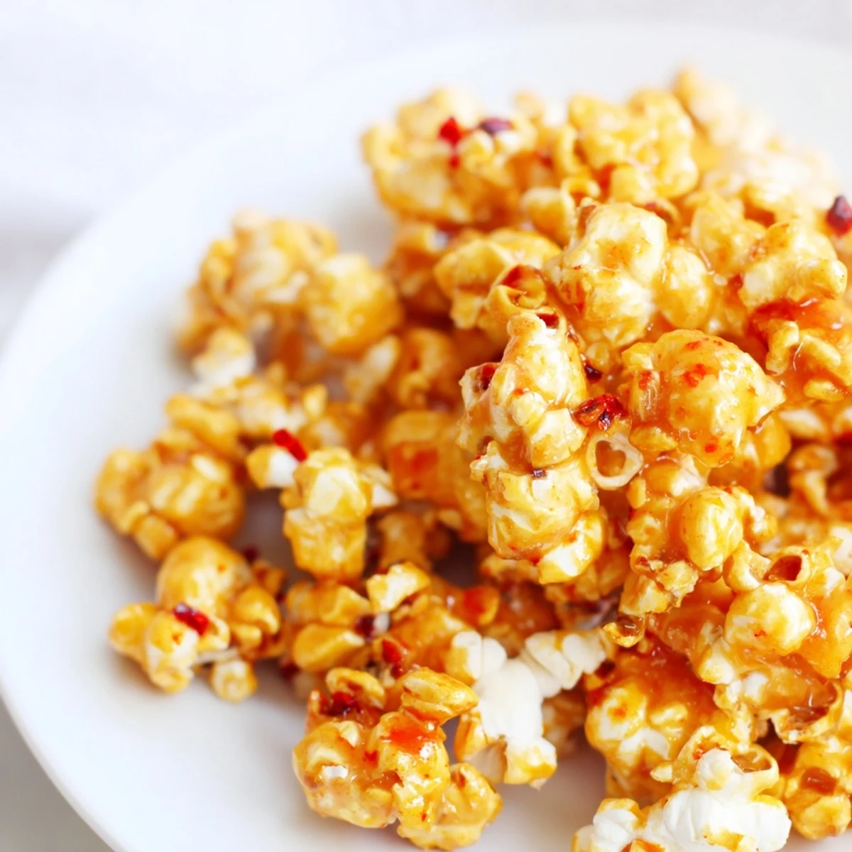 A big bowl of Hot Honey Butter Popcorn, savory, lightly spiced, and perfect for snacking.