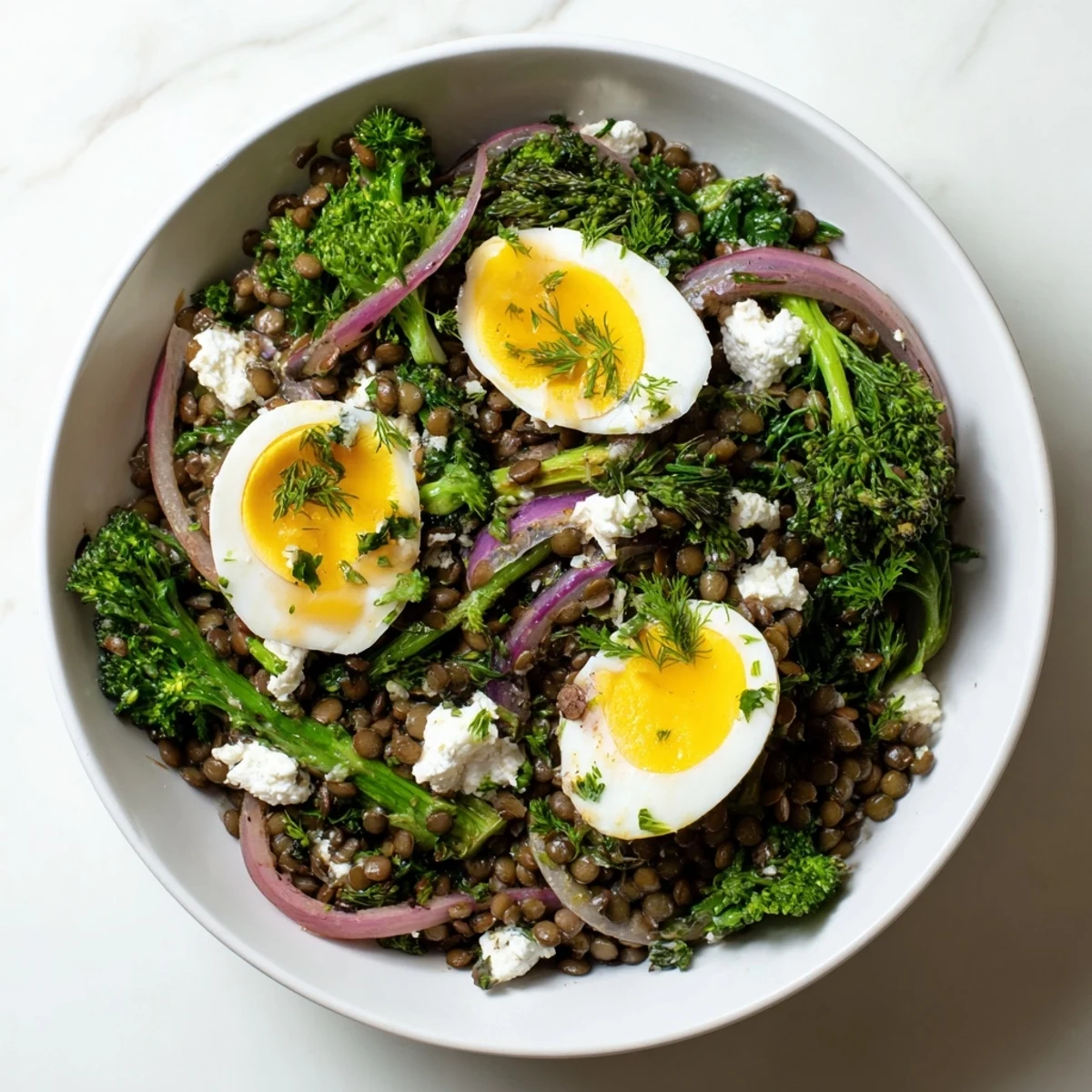 Freshly blanched broccolini and jammy soft-cooked eggs rest atop warm lentils in this vibrant salad.