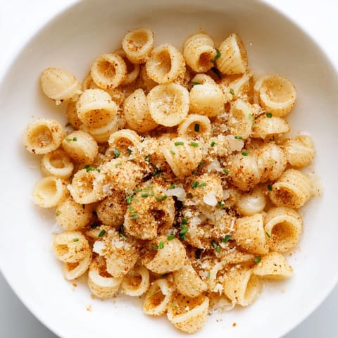 The bowl of Pasta Chip Cereal overflows, the rich parmesan broth soaking into the crunchy chips.