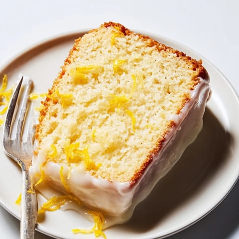 Fluffy Lemon Yogurt Cake, perfect for breakfast or dessert, with a zesty lemon aroma.