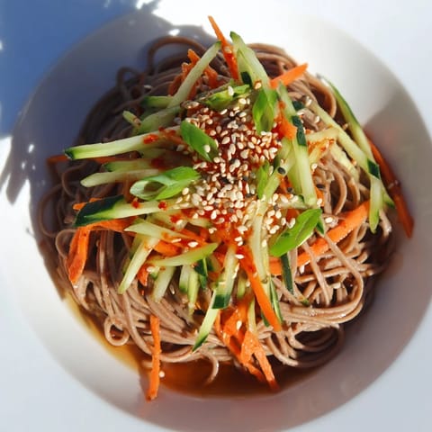 These Chilled Noodle Lunch Cups feature a flavorful sesame sauce drizzled over cold noodles and crisp veggies.