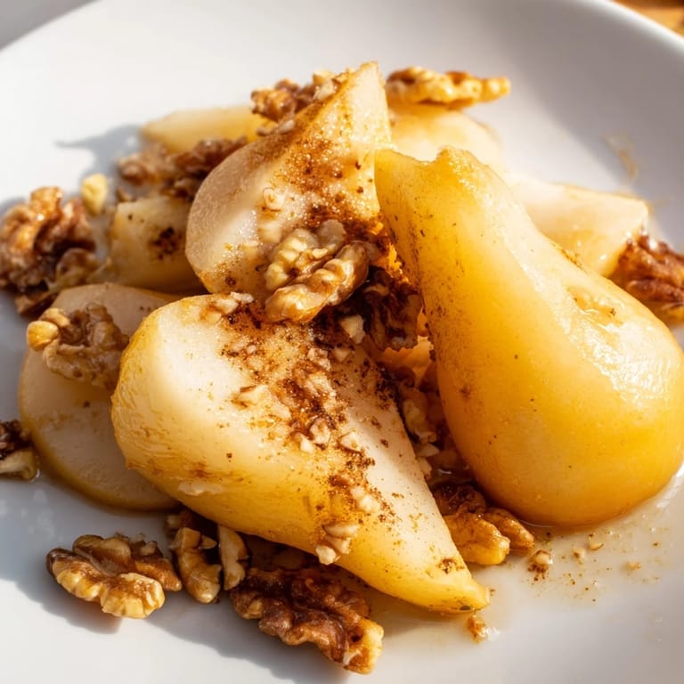 Golden-brown Maple-Warm Cozy Plate: Caramelized Pear and Walnut Bake, with toasted walnuts and sweet syrupy pears.