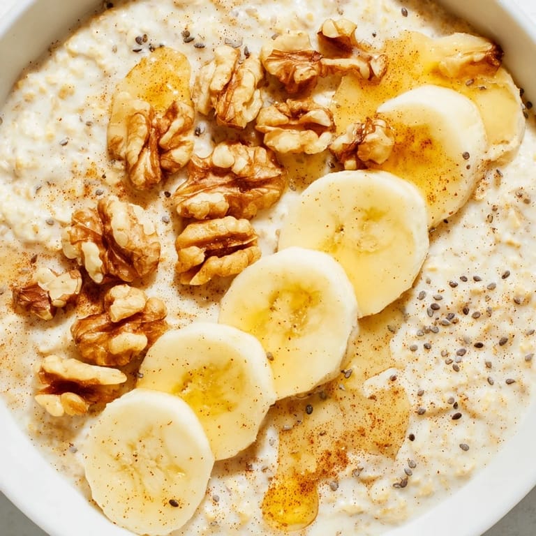 A close-up view of a comforting bowl of sweet and easy Microwave Banana Oats, perfect morning fuel.