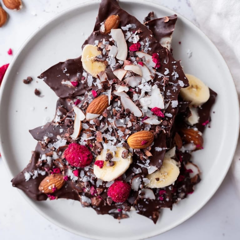 Close-up of Chocolate Banana Bark shows a delicious, sweet dessert loaded with freeze-dried berries.