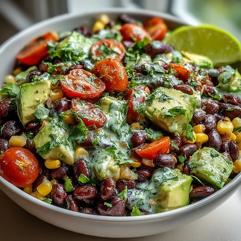 A nourishing Black Bean and Veggie Bowl with crunchy pumpkin seeds, fresh cilantro, and creamy avocado, perfect for a light lunch or easy weeknight vegetarian meal.