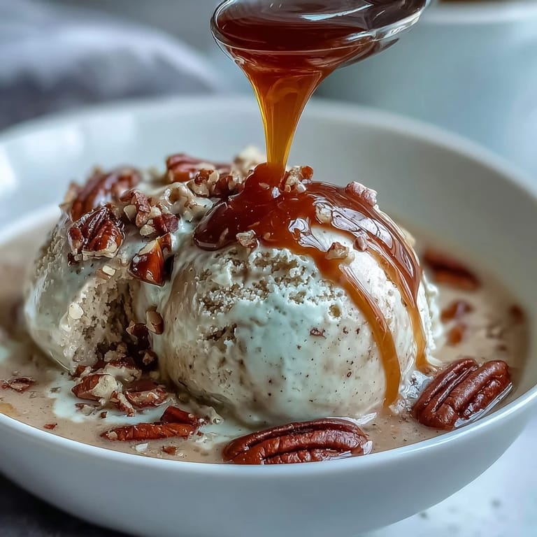 Two elegant bowls of Hojicha Affogato featuring creamy vanilla ice cream, ready to enjoy with a spoon.