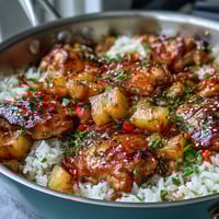 1. Pineapple Chicken and Rice Bake with Teriyaki Glaze: A golden casserole of tender chicken, juicy pineapple, and fluffy rice baked in a glossy, savory-sweet teriyaki sauce.